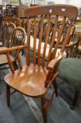 A beech and elm lath back armchair.