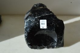 An obsidian glass crystal.