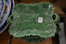A small group of cabbage leaf plates.