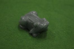 Small carved jade frog.
