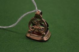 A gilt metal fob seal with plain matrix.