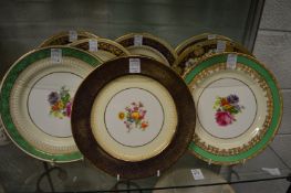 A collection of eight paragon and other floral decorated cabinet plates.