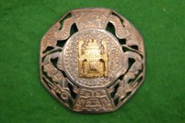 A Siam brooch.