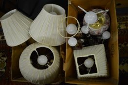 A quantity of table lamps and shades.