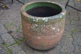 Two terracotta planters.