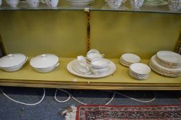 A Paragon part dinner service, plain white with gilt rims.