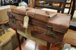 Leather suitcase and a satchel.