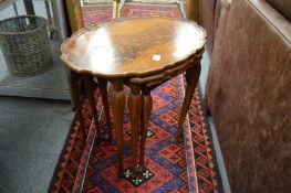 A mahogany nest of tables.