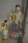 Two Chinese pottery figures.
