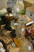 Oil lamps and shades etc.