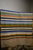 A flat weave Kelim of striped design 186cm x 105cm.