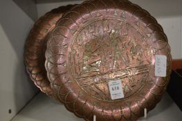A pair of Egyptian inlaid copper dishes.