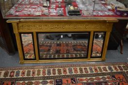 A Regency gilt framed over-mantle mirror.