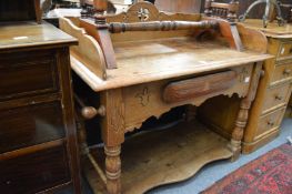A Victorian pitch pine washstand.