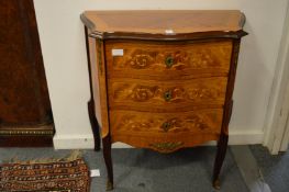 A French design mahogany and marquetry decorated serpentine fronted three drawer petit commode.