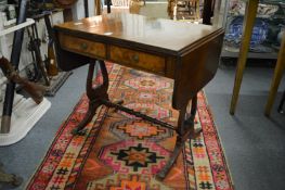 A small mahogany sofa table.