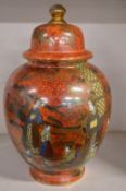 A Wilton Ware lustre decorated jar and cover.