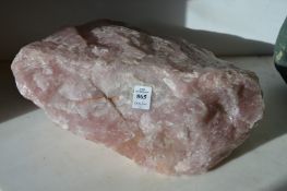 A large piece of rose quartz approx 36cm wide.