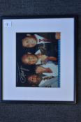 Boxing interest, a colour photographic print signed by Muhammad Ali, Joe Frazier and George