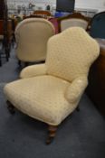 A Victorian upholstered nursing chair.