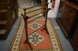 A Victorian mahogany towel rail.