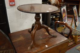 A mahogany tripod table (alterations).