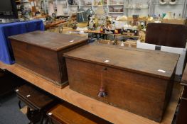 A small oak blanket box and a similar pine box.