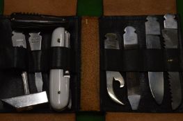 A leather cased tool kit.