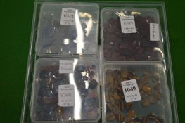 Four boxes of decorative stones.