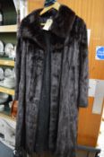 A ladies fur coat.