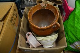 Three early excavated earthenware bowls.