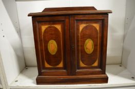 A good Edwardian inlaid mahogany table top cabinet.