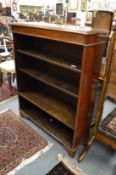 A mahogany open bookcase.