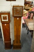 A 1930's walnut grandmother clock.