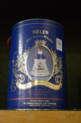 Bells whisky contained in a pottery bell shaped decanter with original box to commemorate the