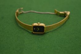 A Ladies wristwatch.