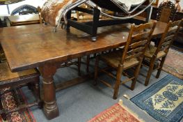 A good large heavy plank top refectory table on turned supports.
