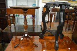 A tripod table and jardiniere stand.