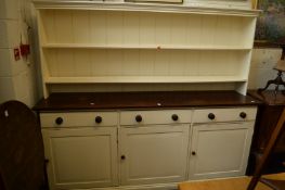 A large painted and stained pine dresser.