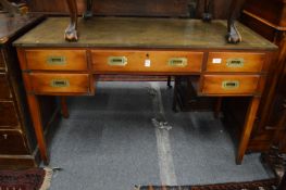 A military style brass bound writing desk with green leather inset top.