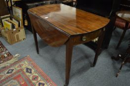 A George III mahogany Pembroke table.