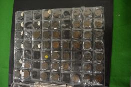 A folder containing a good collection of farthings from the reign of Charles II up to and