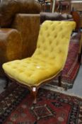 A Victorian gold draylon button upholstered nursing chair.