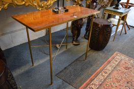 A stylish rosewood and brass rectangular console table.