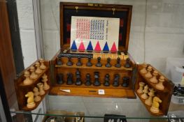 A good oak cased games compendium.