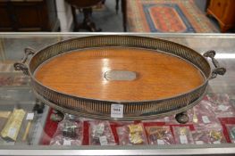 Silver plated and oak twin handled gallery tray.