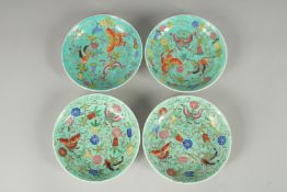 A SET OF FOUR TURQUOISE DISHES.