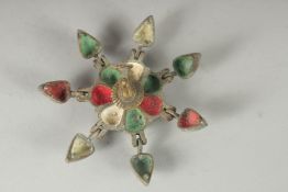 A SMALL INDIAN BRONZE SPICE BOX, with hinged petals and peacock finial.