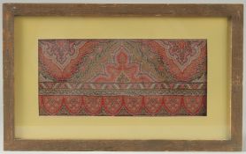 A FRAMED AND GLAZED INDIAN TEXTILE. 13cm x 28cm..