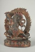 A TIBETAN BRONZE DEITY, with detachable halo.